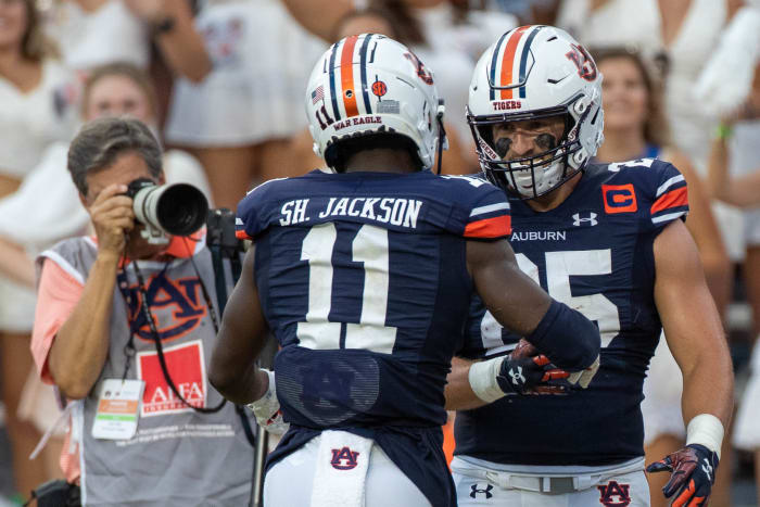 Shedrick Jackson and John Samuel Shenker.